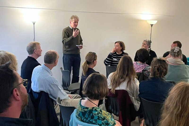 A person speaking to an audience