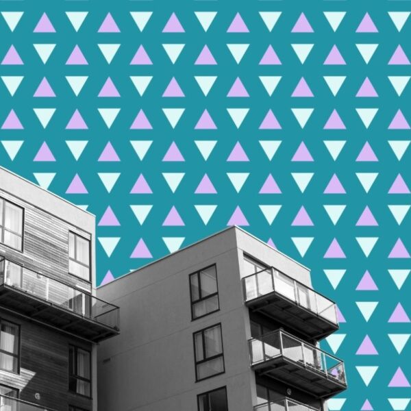 Black and white cut-out photo of flats on a colourful pattern background