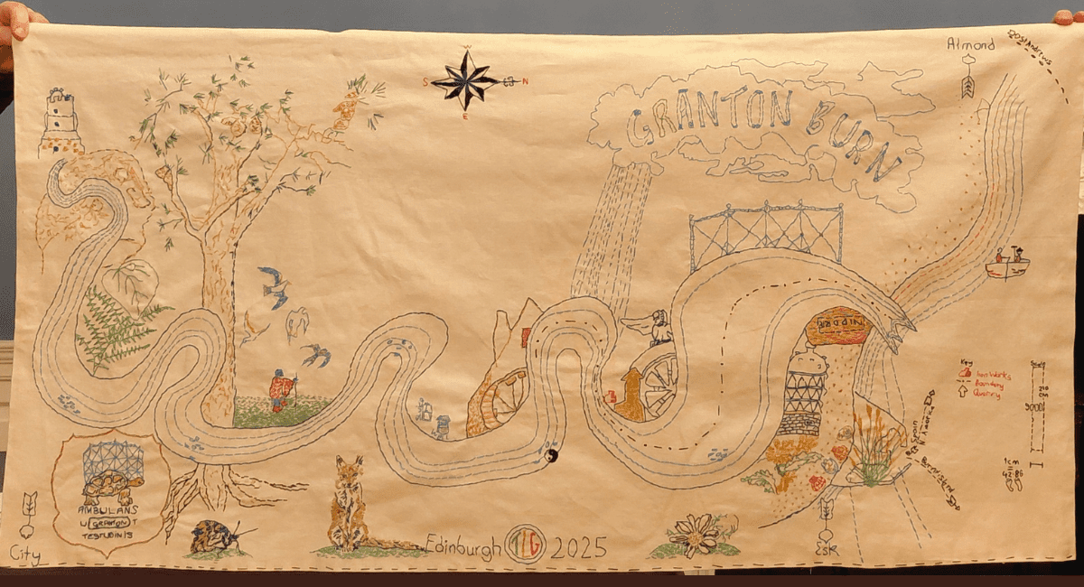 Handstitched map of a stream.
