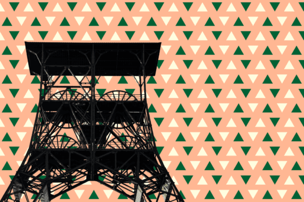Image of a black, metal industrial structure overlaid on a peach background with triangle decoration.